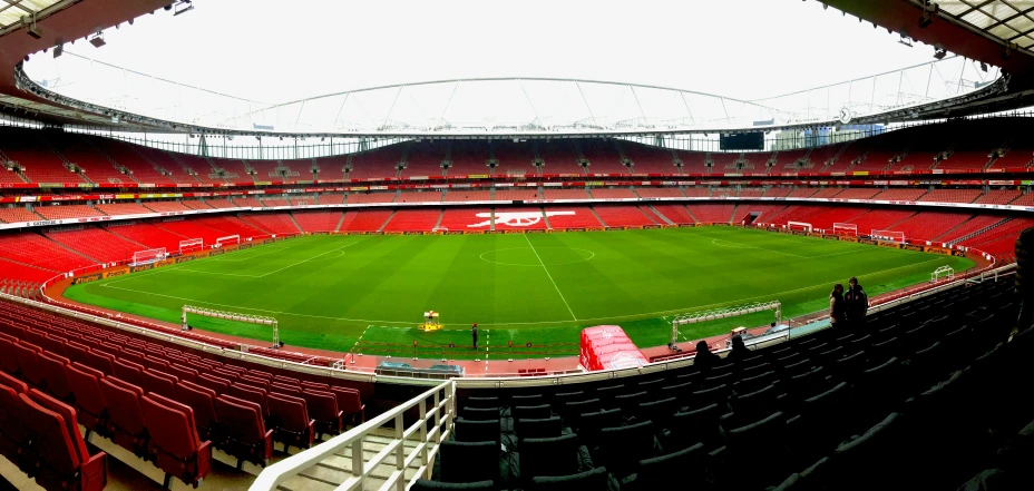 an empty soccer stadium with a view from the middle row