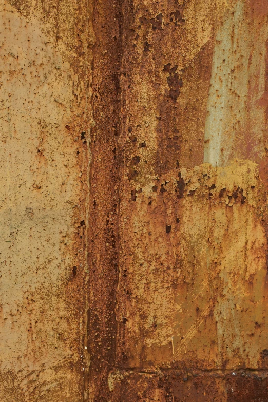 an old rusted metal surface with small bumps and dots