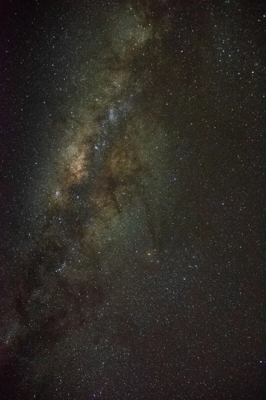 a night sky with stars and milky lights