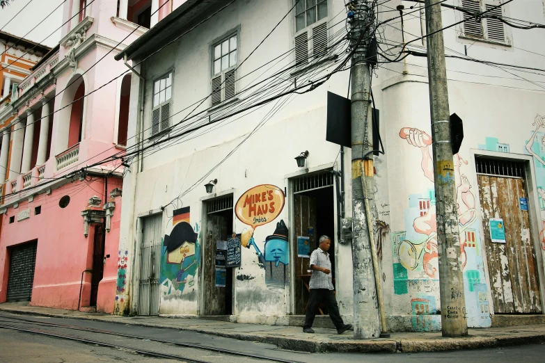 people are standing outside of an old building