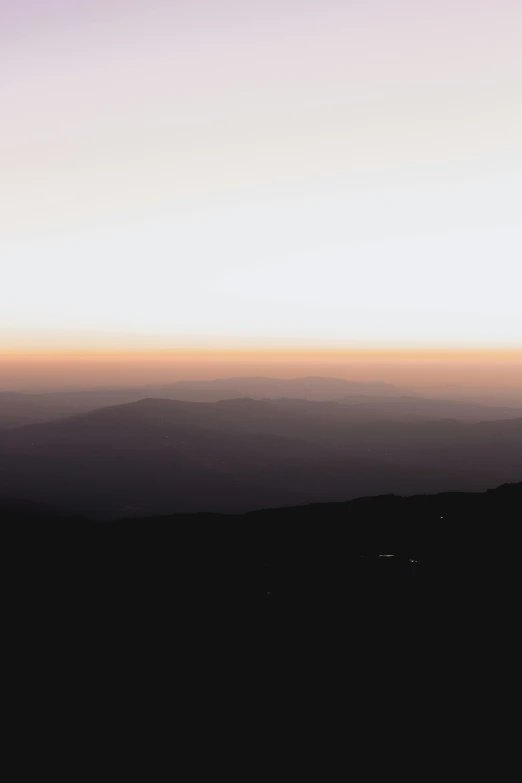 an image of silhouette of a mountain top