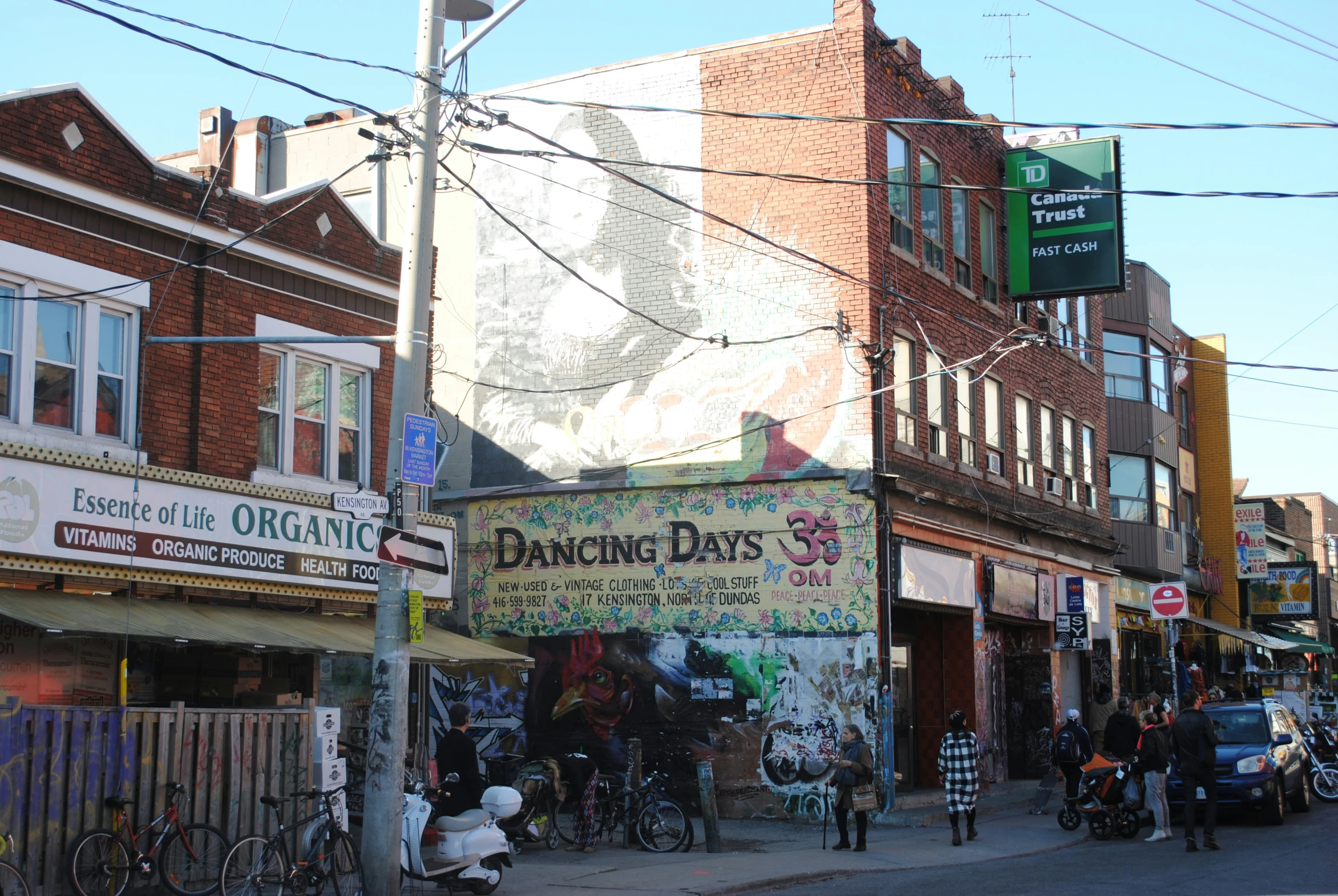 a street with some stores and bicycles parked