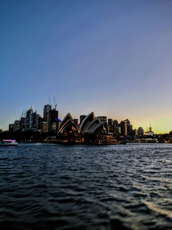 a picture of some buildings and a river