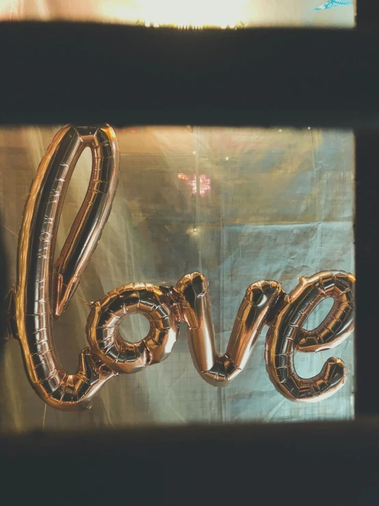 a close up of a sign made with foil