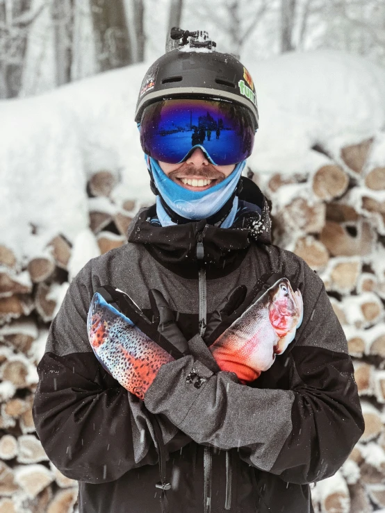 a boy wearing skis is standing in the snow