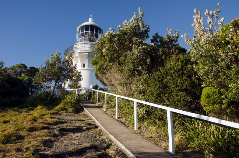 a pathway that runs up to the top of a lighthouse