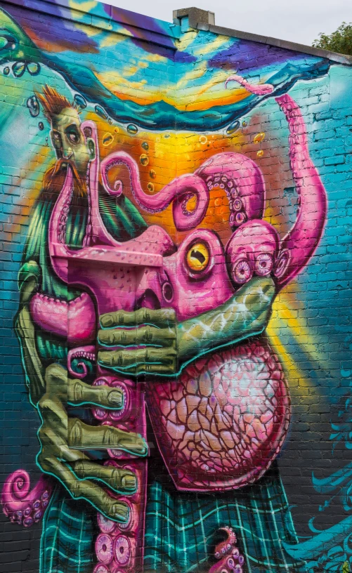 this street art has been tagged with color