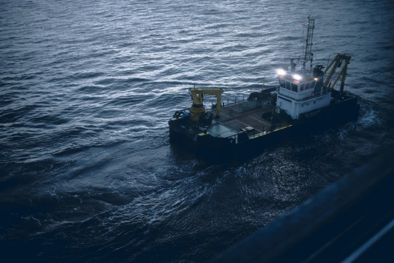 the large ship is moving through the water