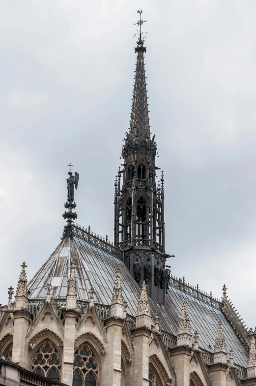 an architectural building with a steeple has many spires