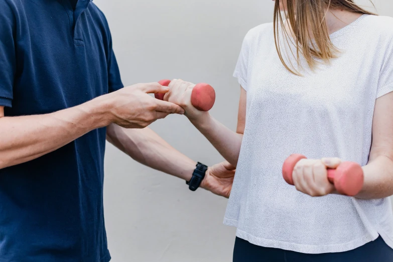 a man and a woman standing next to each other