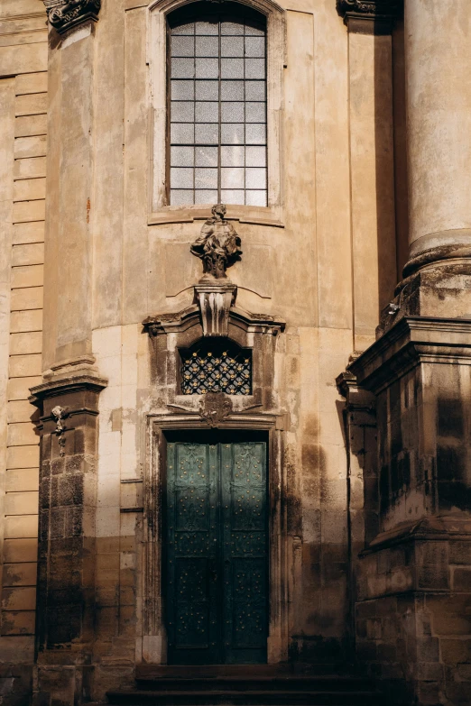 a large, ornate doorway in the corner of a building