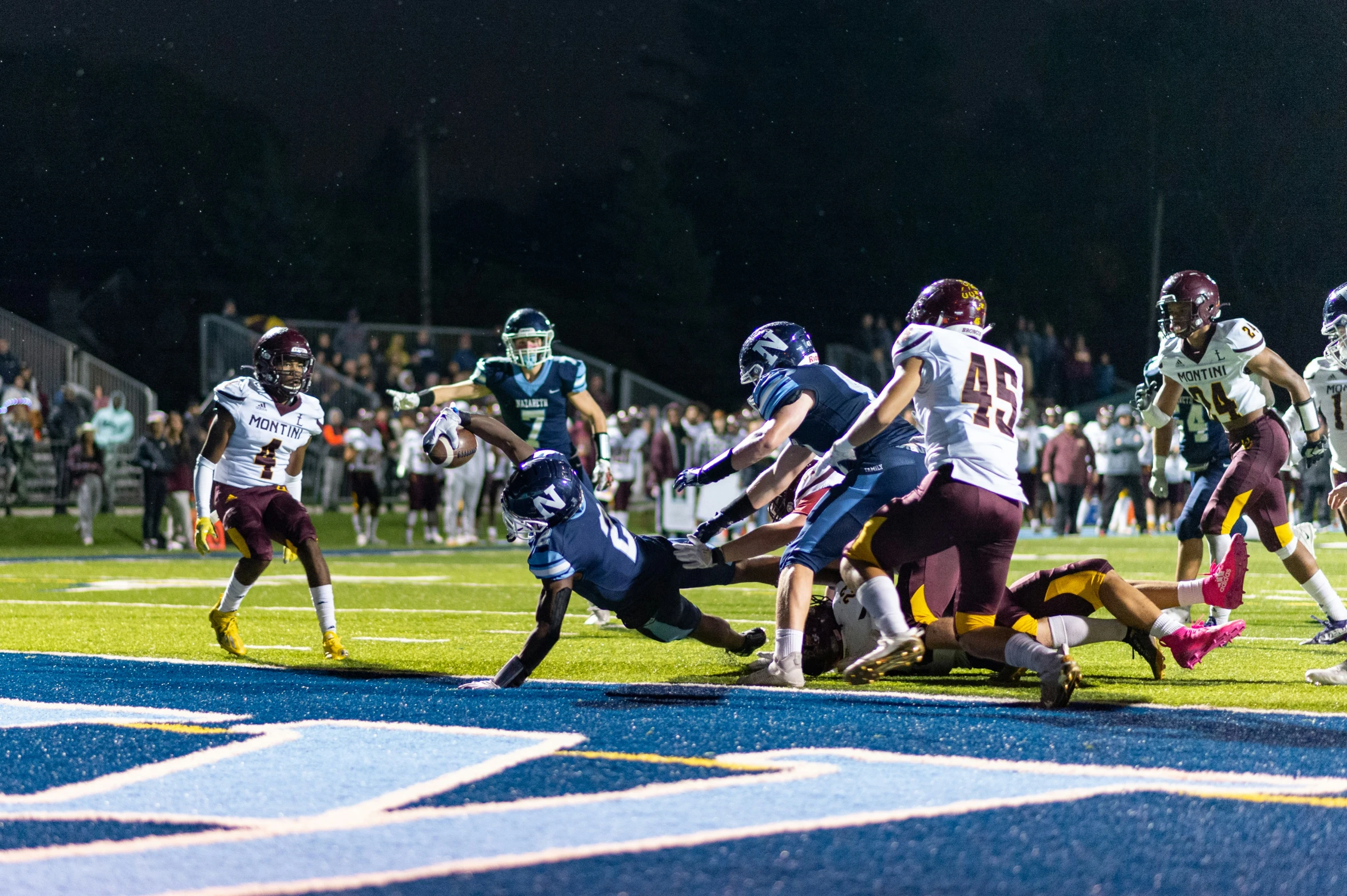 the football team is playing a game on the field