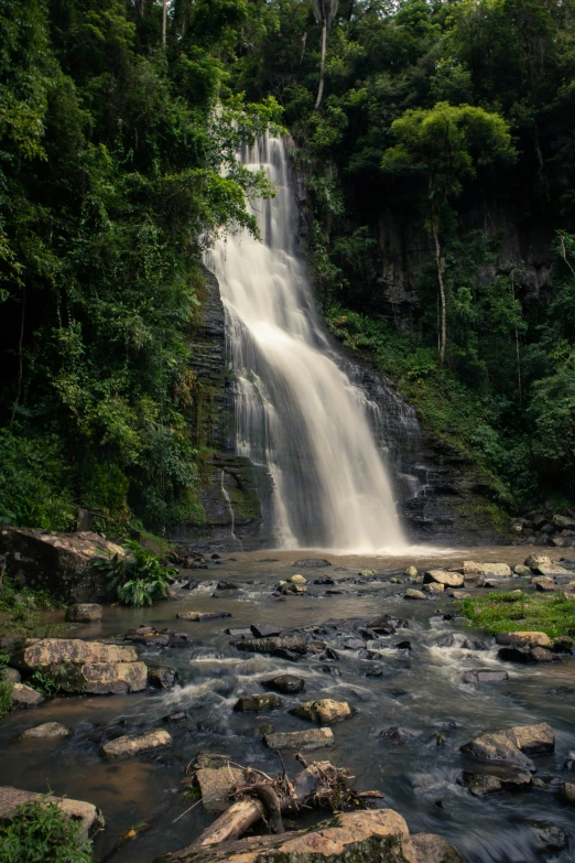 a very tall waterfall and its water fall
