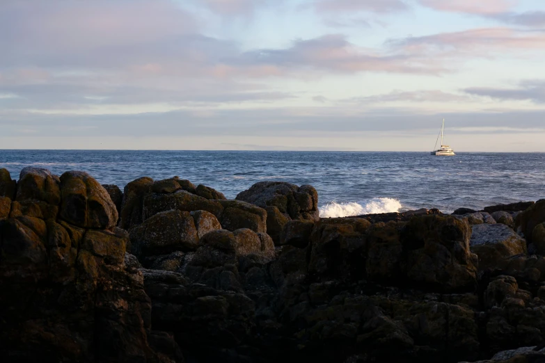 a sailboat out on the ocean during the day