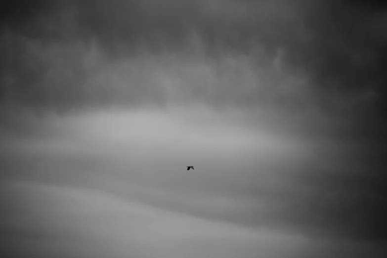 two small airplanes flying in a cloudy sky