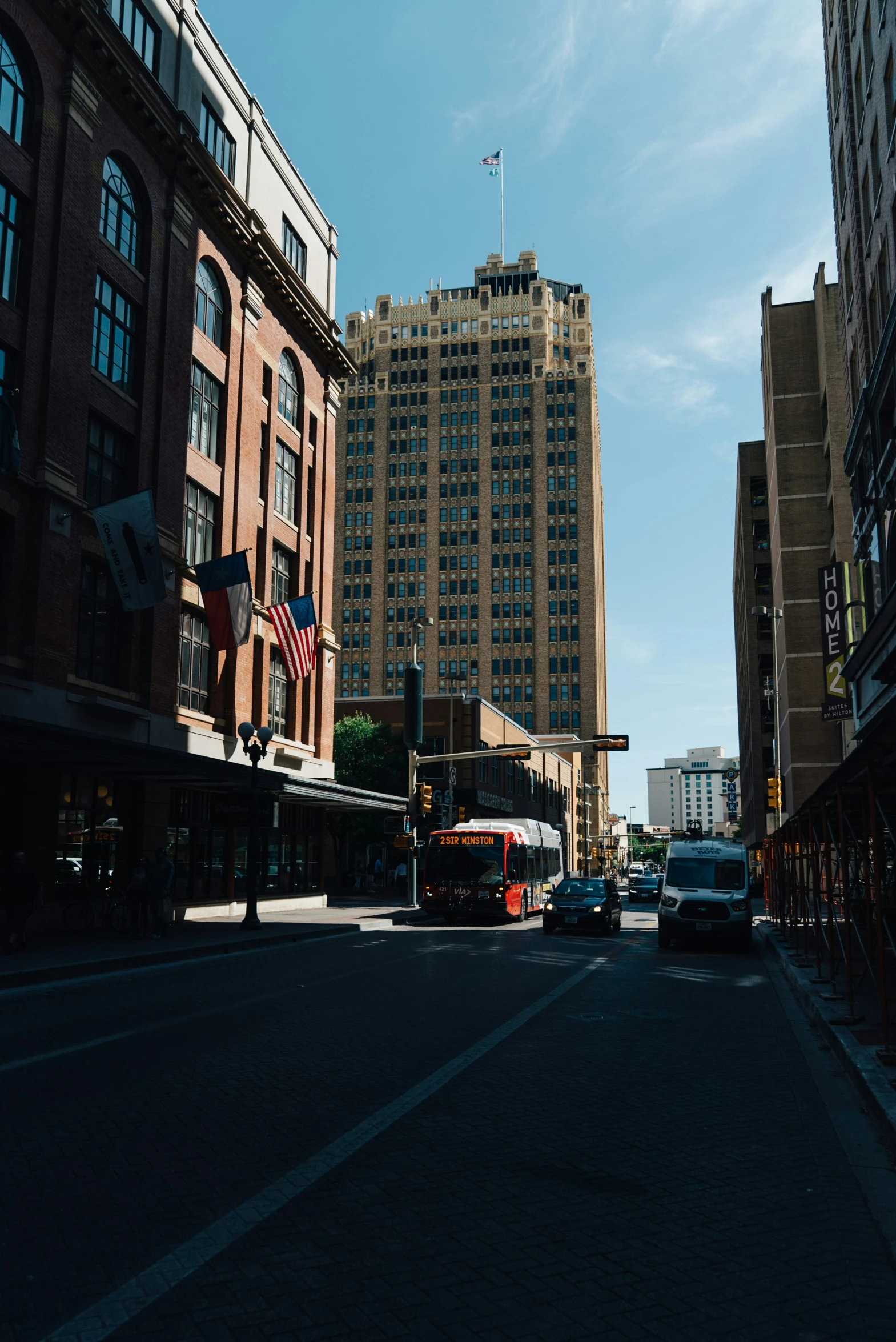 a city street with skyscrs and buildings