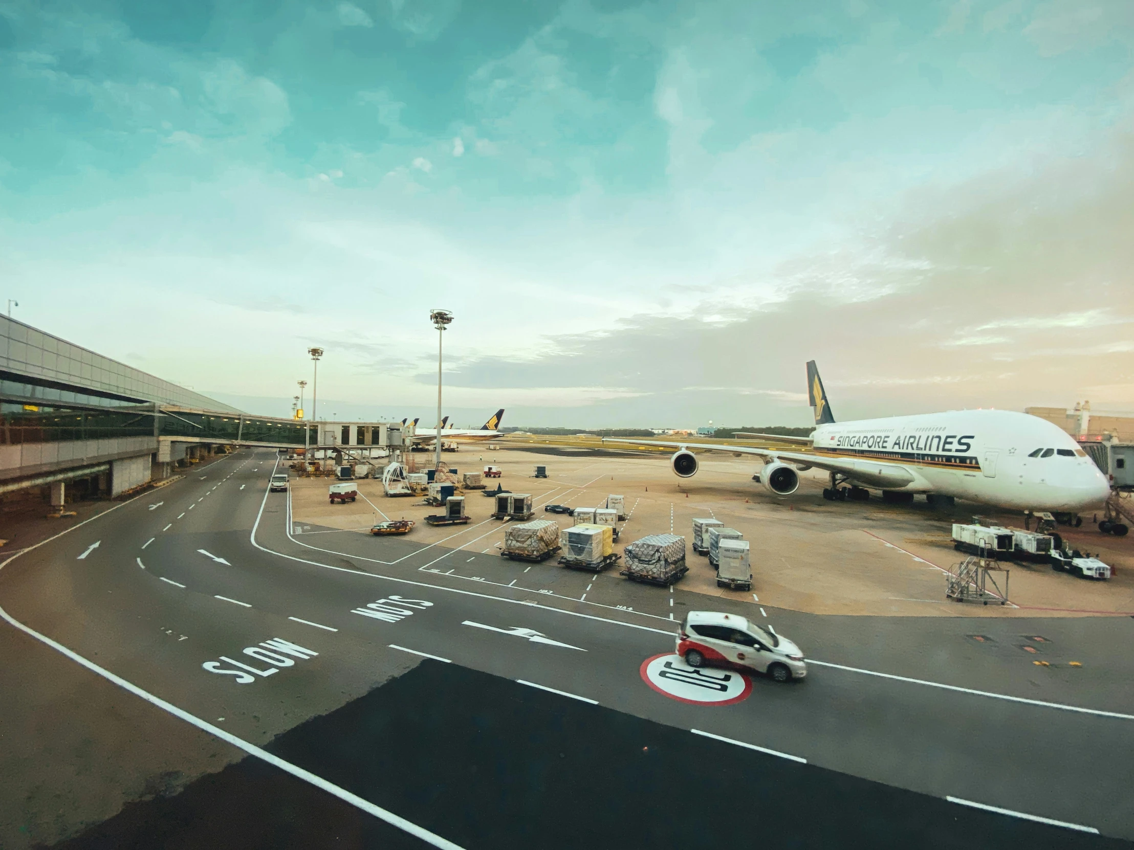 the jumbo jet is parked at the airport