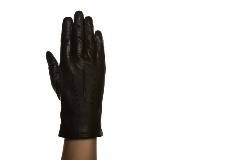 a person with their hands in a black leather glove