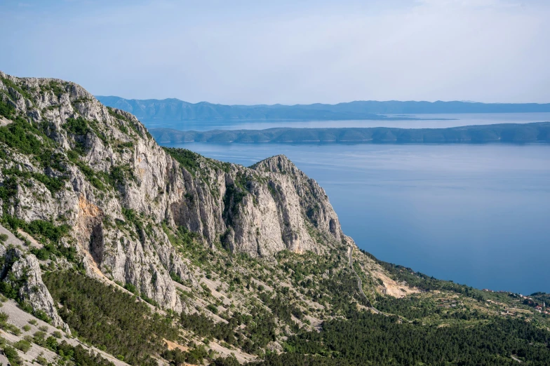 an incredible view from a cliff in front of the ocean