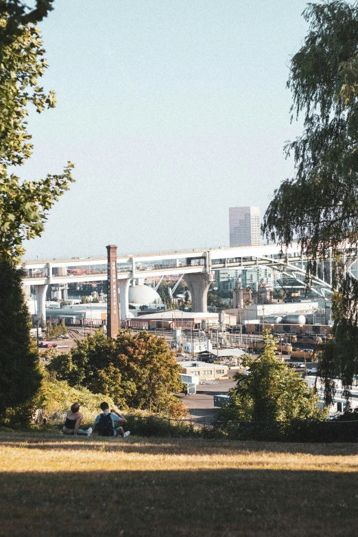 a bench with several people on it in the distance