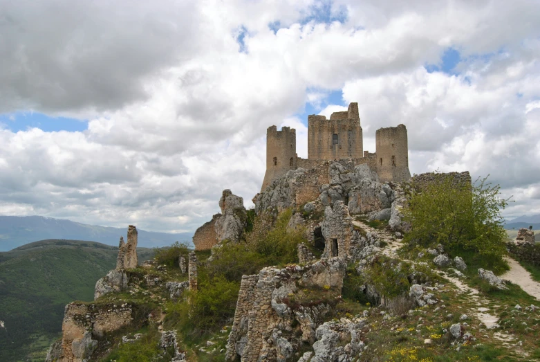 old ruins on the edge of a valley