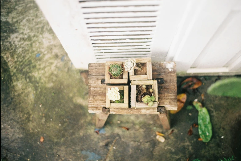 some wood crates are stacked on top of each other