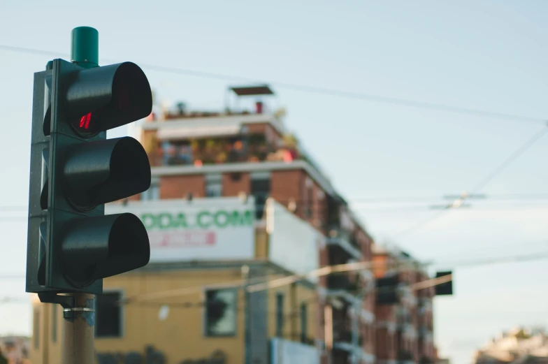 a traffic light with the red signal turned green