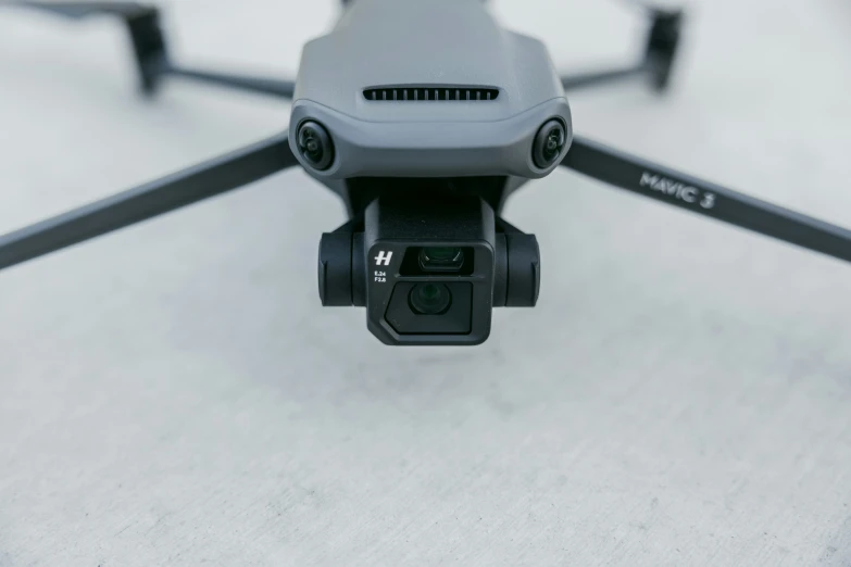 a view from above of a silver camera mounted on a control controller