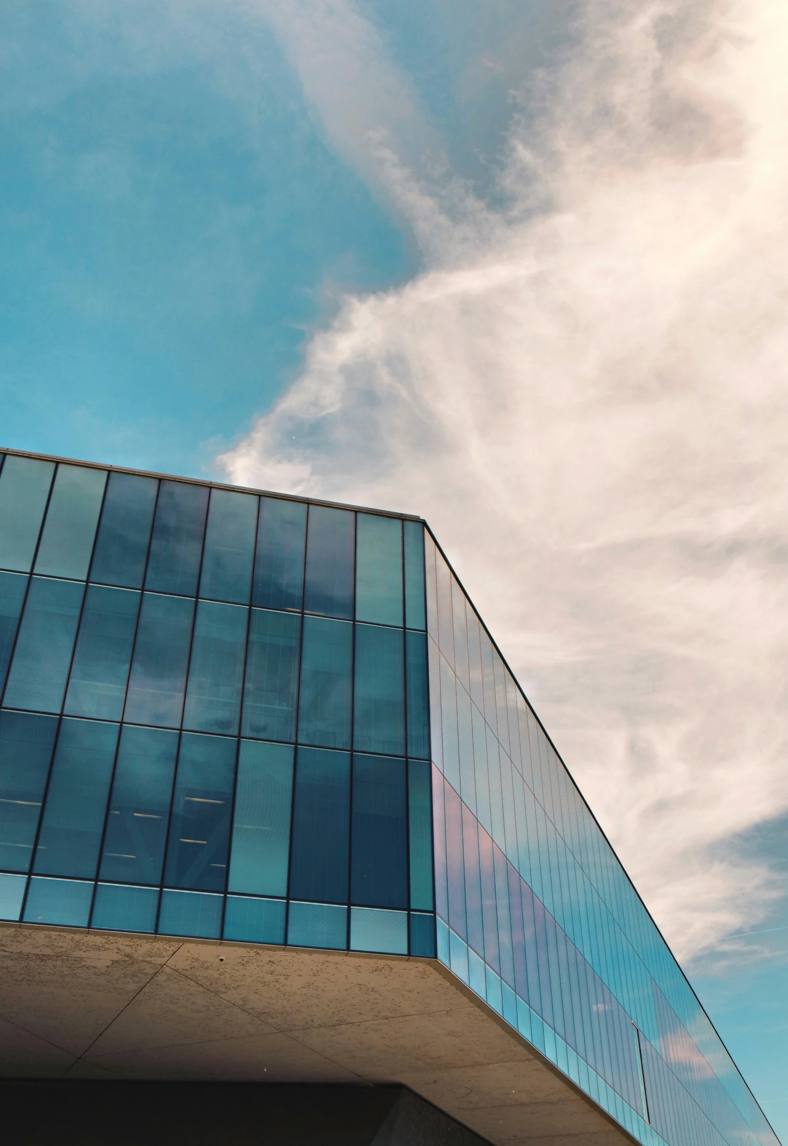 a close up image of a building and a very blue glass