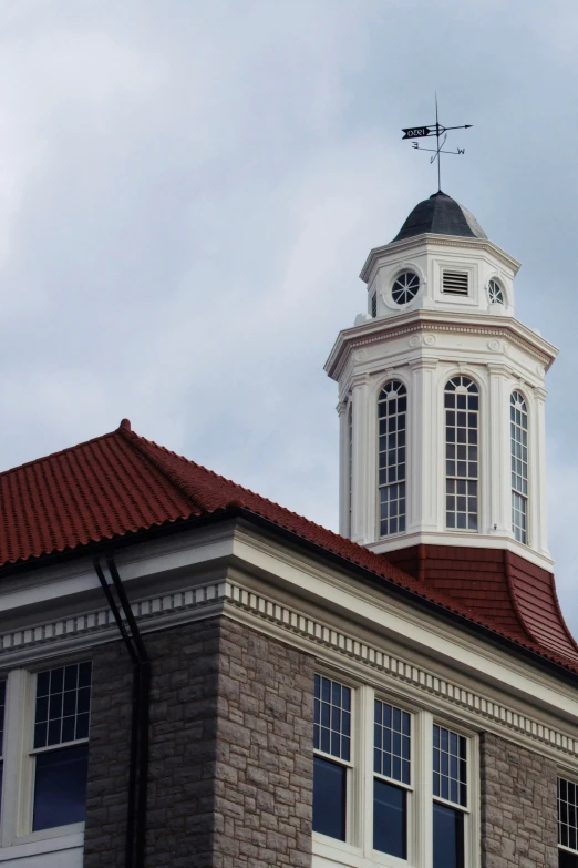 the large clock is on top of the tower