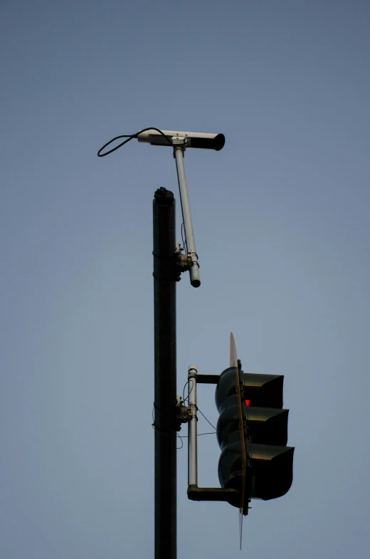 there is a traffic light and some wires