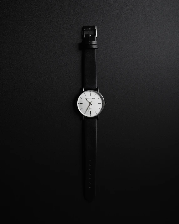 watch displayed on black background, possibly for promotional use