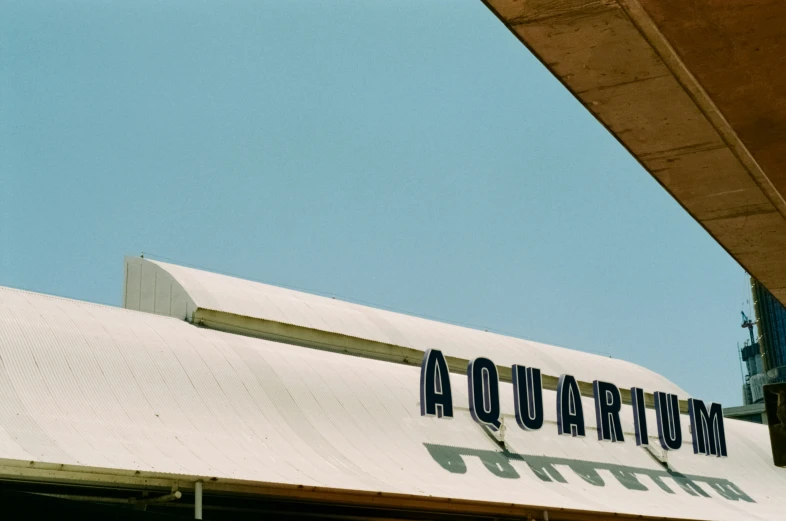 an airplane sits atop of a large structure