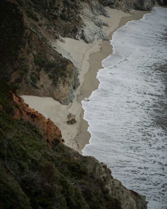 an image of a very sandy beach in the ocean