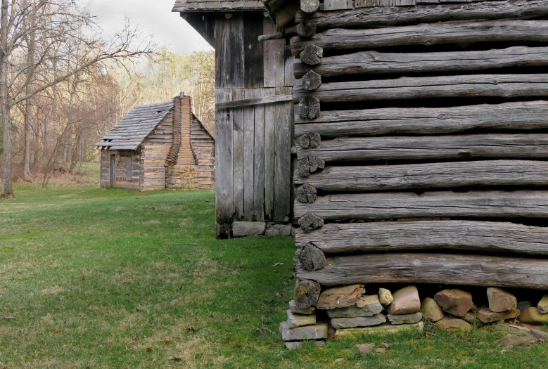 there are two small barns built with wood