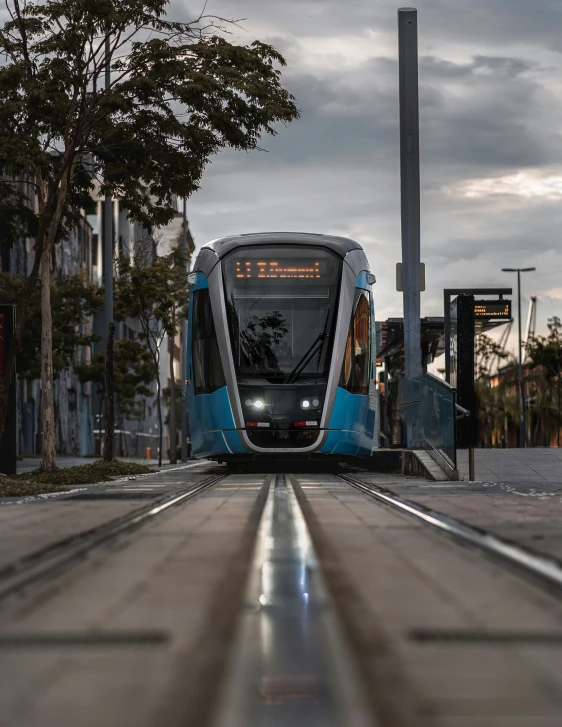 the metro train makes its way up the tracks