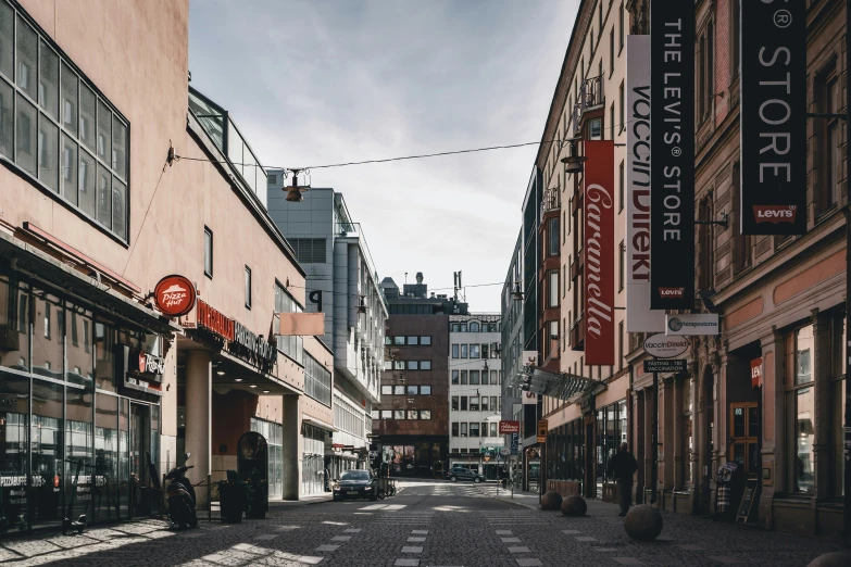 the view of several buildings on a city street