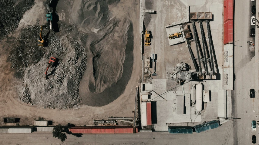 an aerial view of some concrete and construction equipment