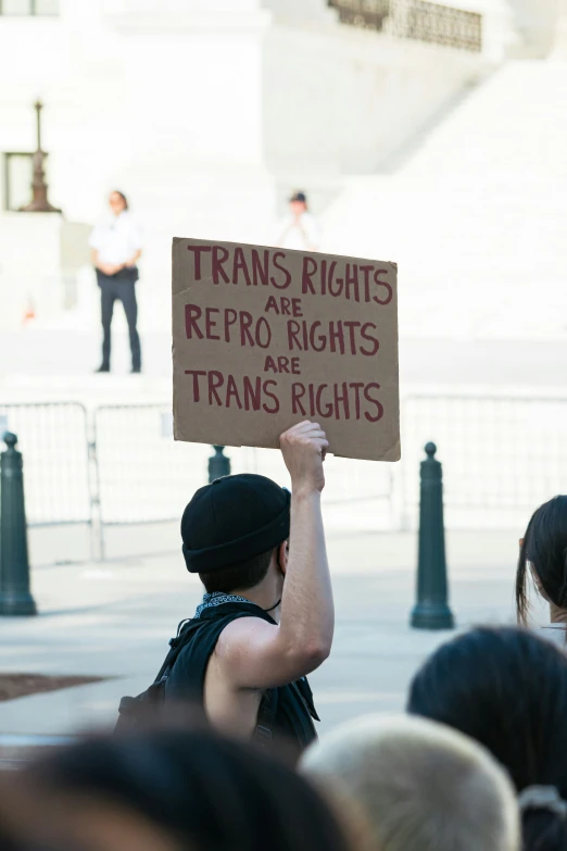 protesters are protesting on a city street