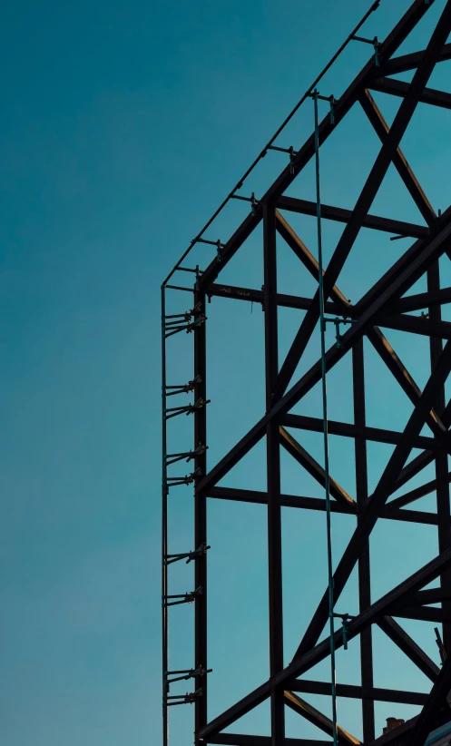 an airplane that is flying by a structure