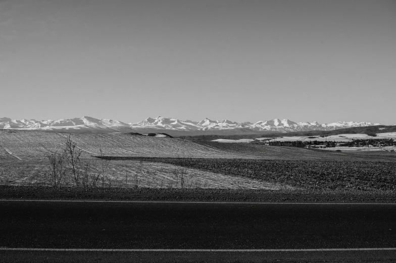 black and white po of snow covered mountains