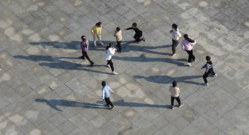 a group of people who are standing around