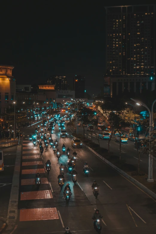 a city street with lots of cars moving on it