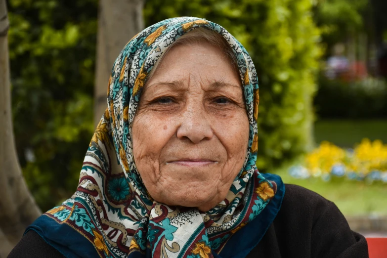 a woman in a scarf on her head