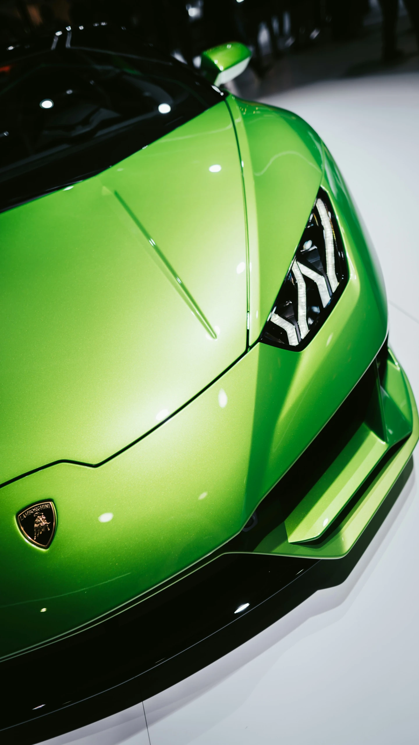 a close up of the top of a bright green sports car