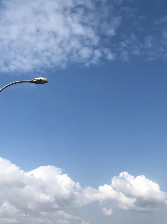 an image of a street light going up