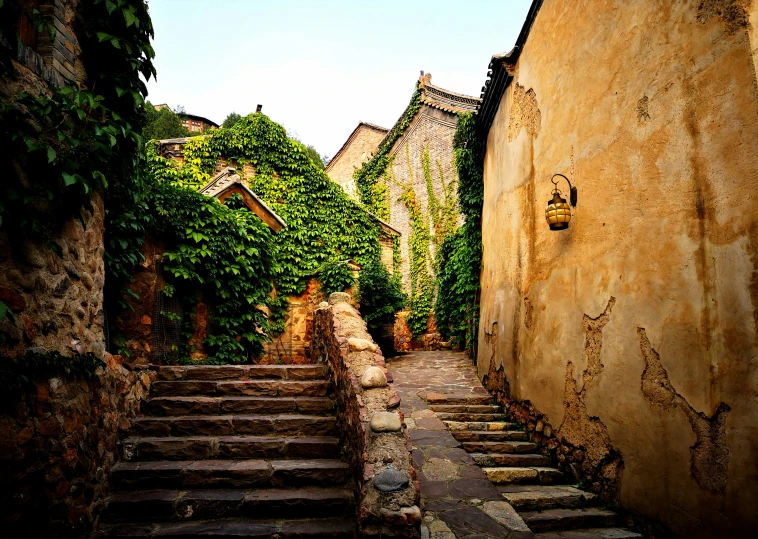 an old stone stairway going between two buildings