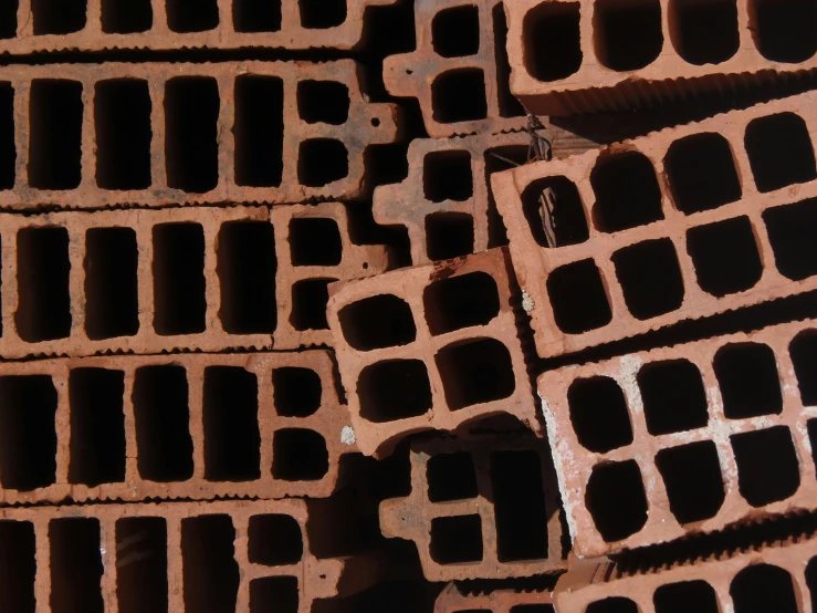 several brown brick squares that are stacked in the middle