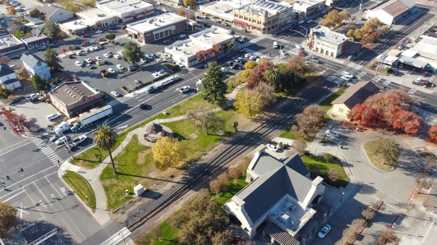 an aerial view of an intersection in the town