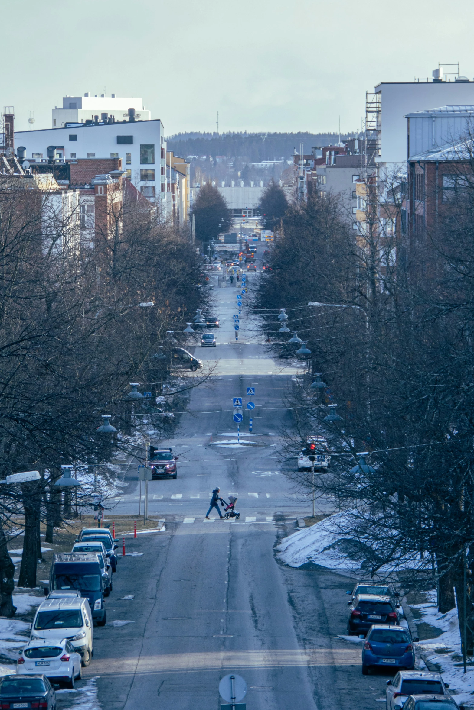 several cars parked on the side of a road